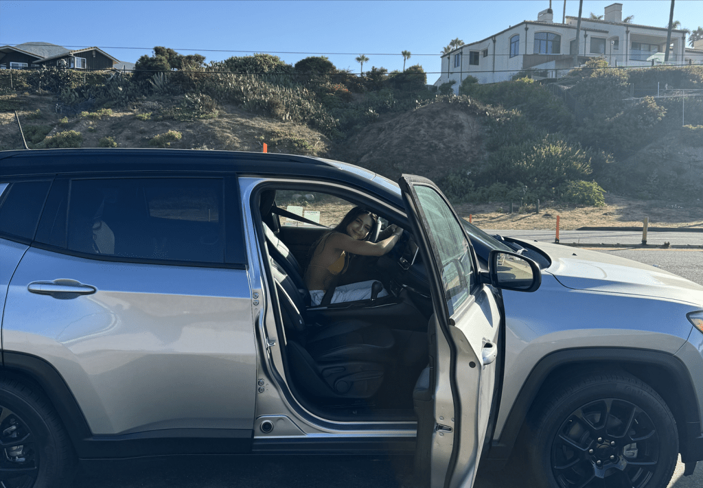 Karla Suzuki parks her Jeep on PCH near Zuma Beach on Sept. 5. She was able to promptly attend her Surf Connection Chapel this Wednesday. Photo Courtesy of Pamela Martinez